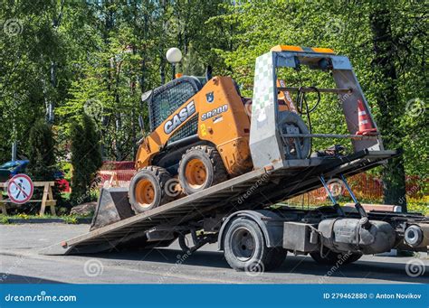 towing a skid steer truck